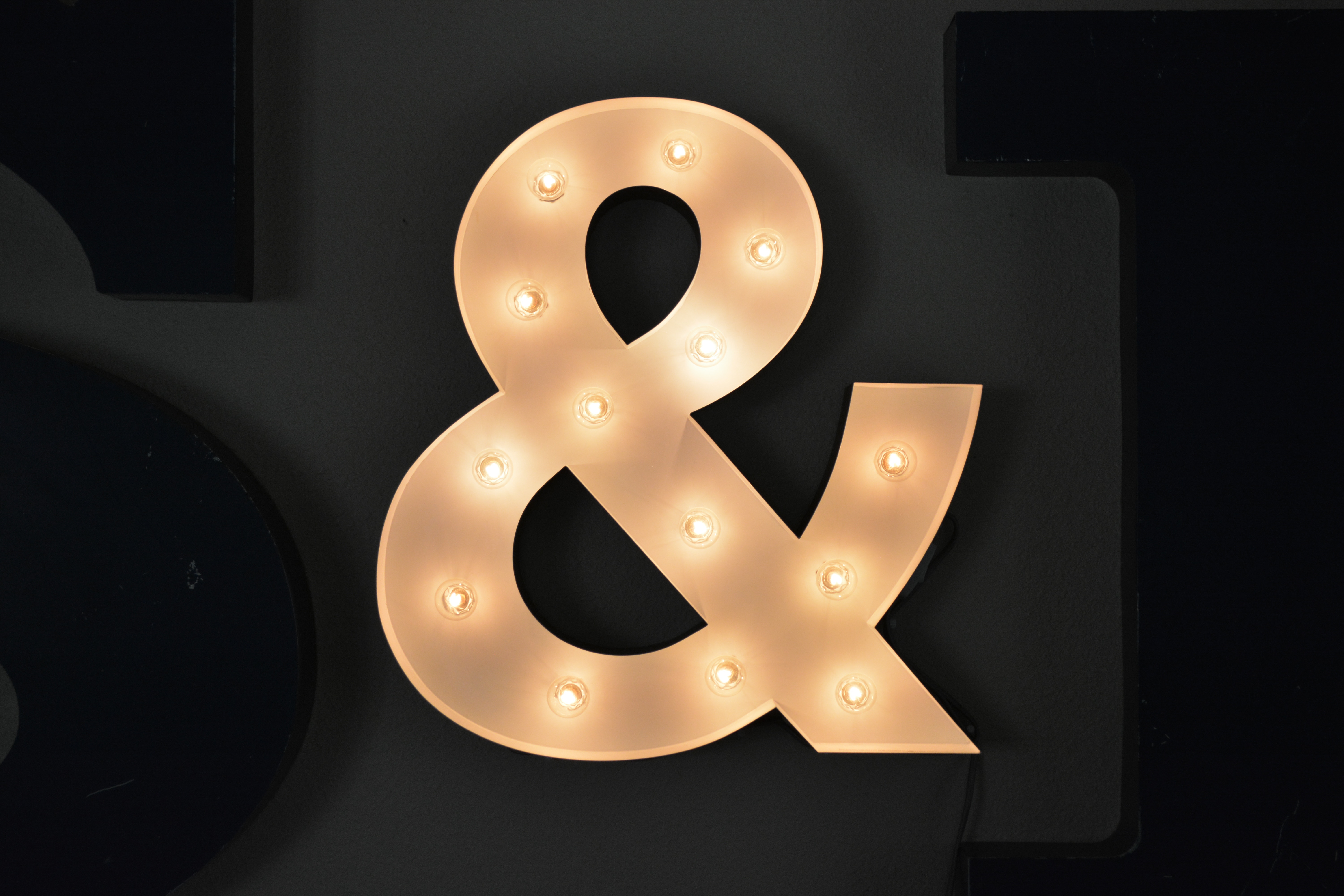 ampersand vanity light style